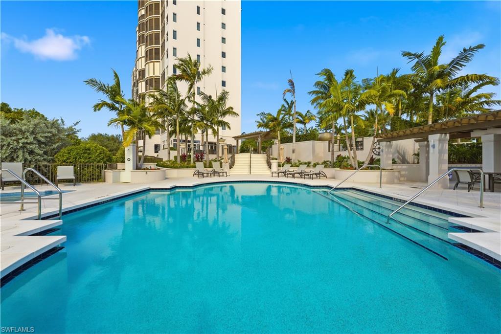 Community pool featuring a patio area