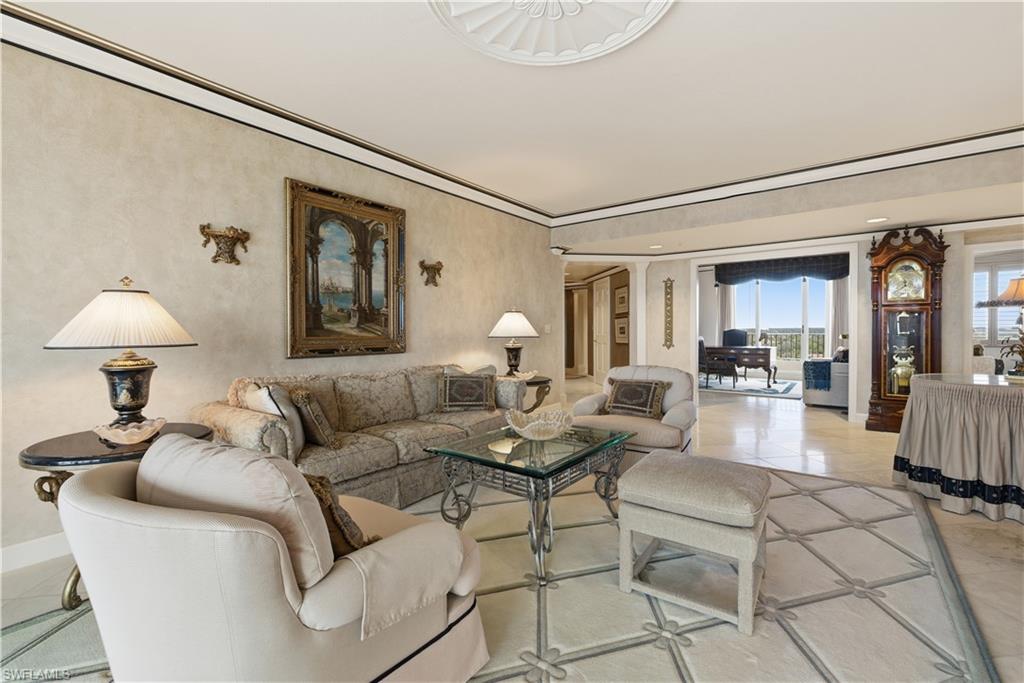Living room featuring light tile patterned floors