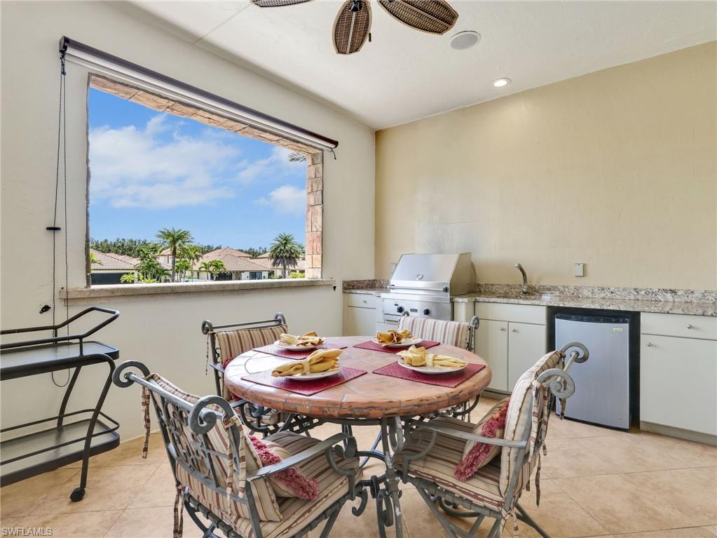 Main Level Balcony featuring an outdoor kitchen and alfresco dining