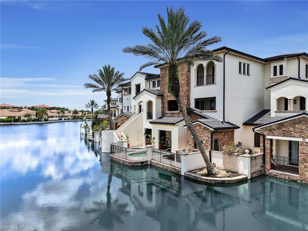 Luxury Villa w/ serene water views featuring a private pool/spa in the heart of Talis Park