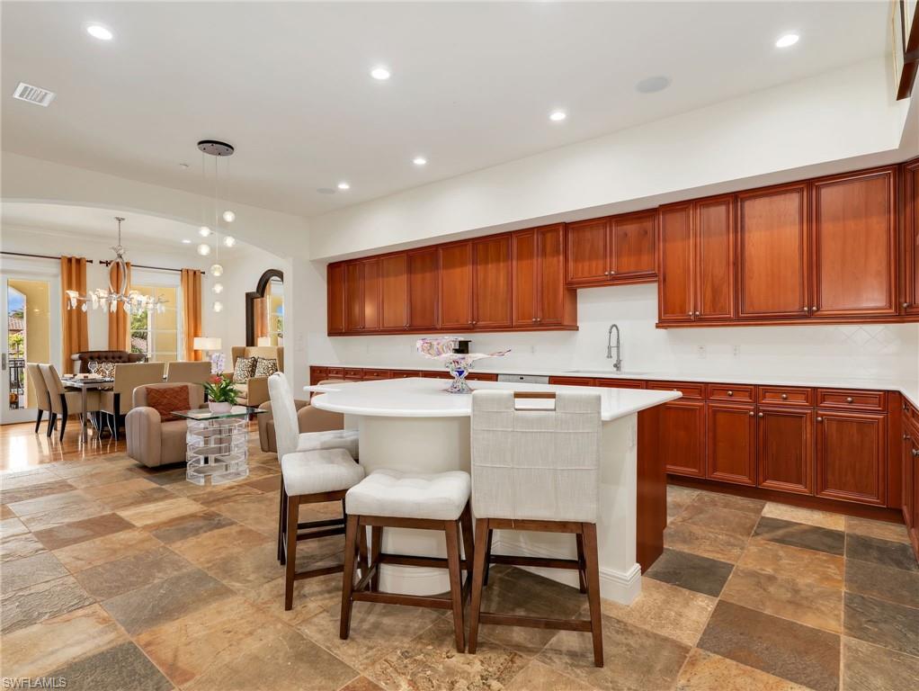 Kitchen featuring slate flooring and Quartz Countertops