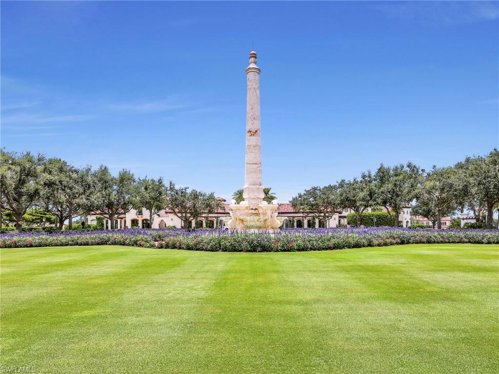 The Great Lawn with a central stone obelisk fountain