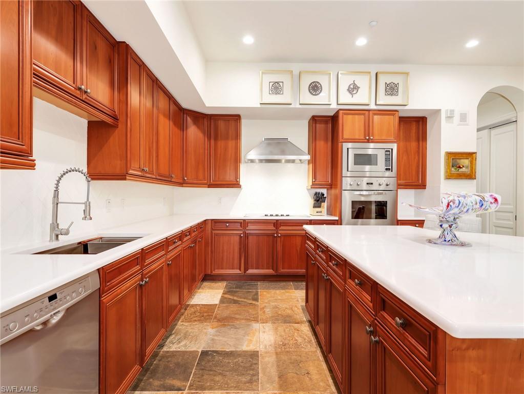 Kitchen featuring slate flooring and Quartz Countertops