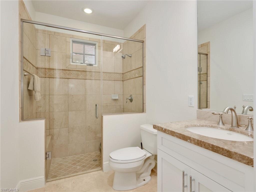 Guest Bathroom Walk-in shower with clear glass enclosure on the ground floor