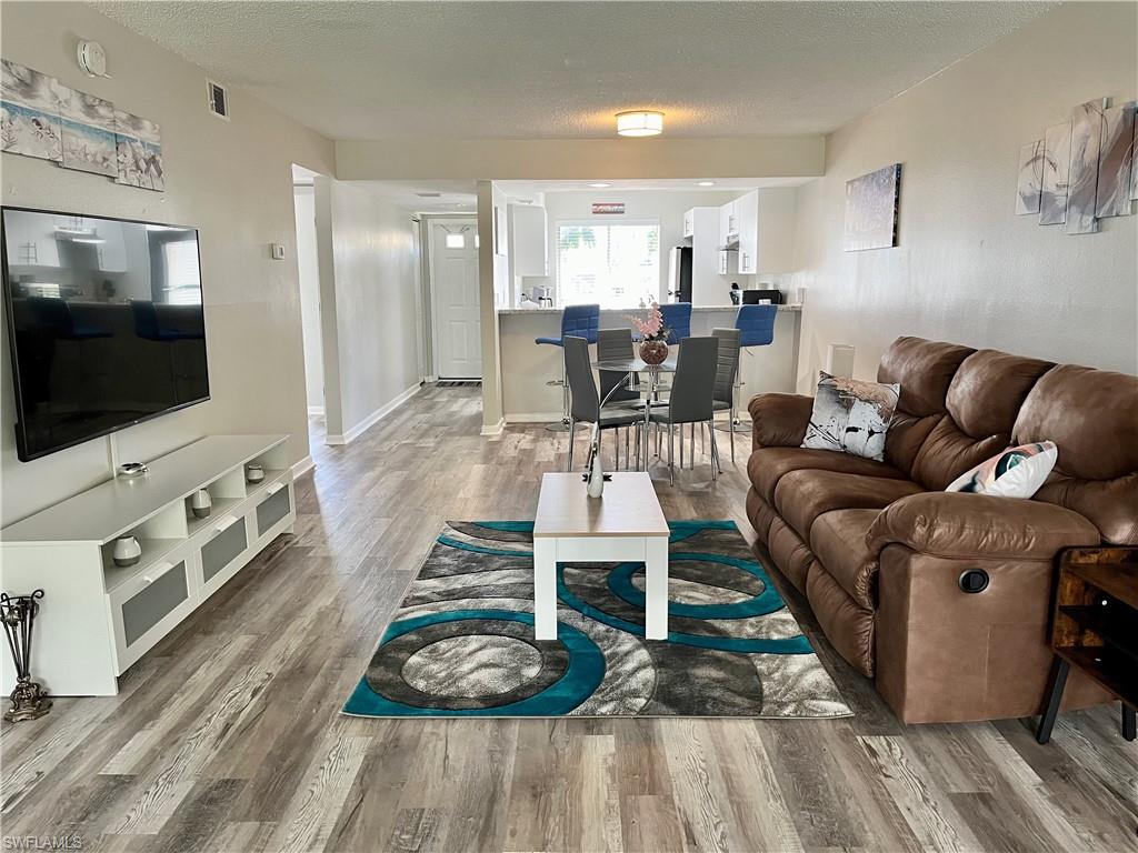 Oversized living room with enclosed lanai space