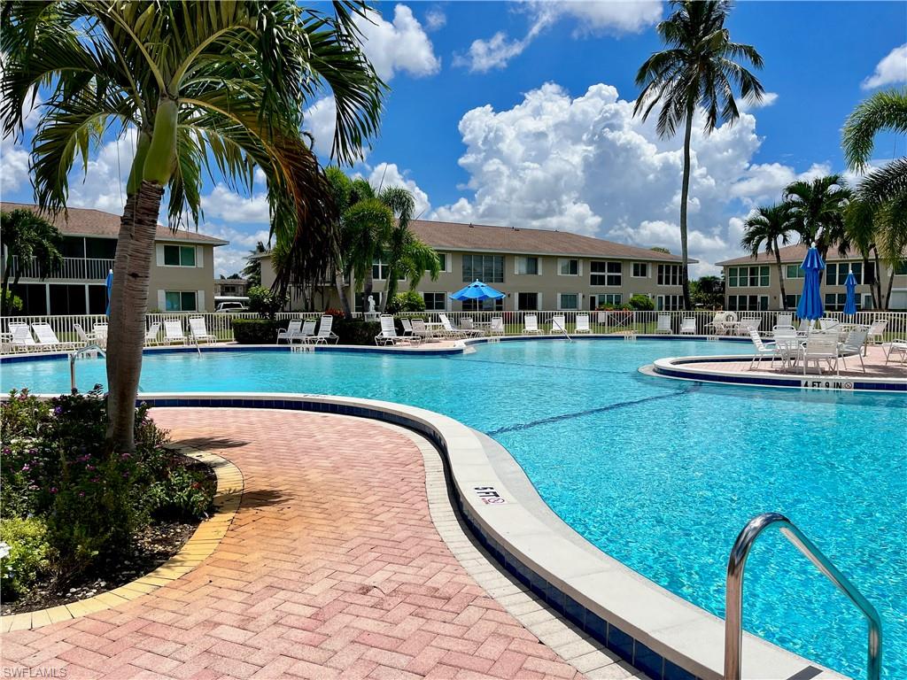Relax at the pool with chairs and umbrellas