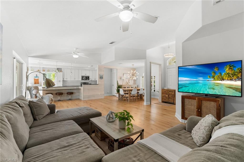Living area with wood-finish flooring