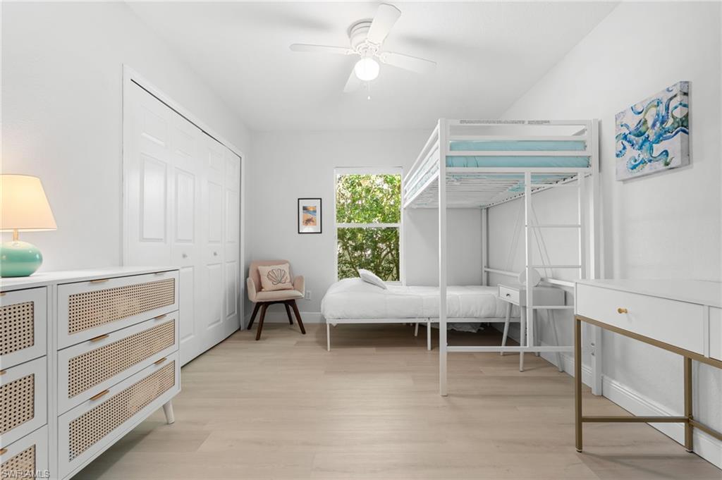 Bright interior room featuring light wood-finish flooring