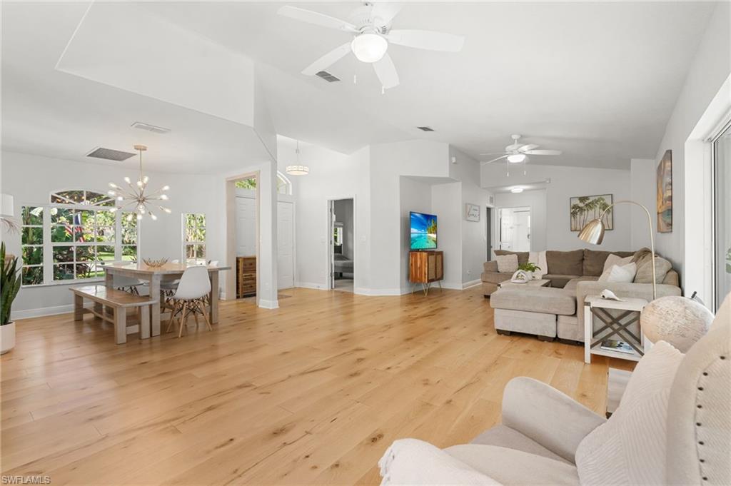 Vaulted ceilings, spacious living room/ dining area