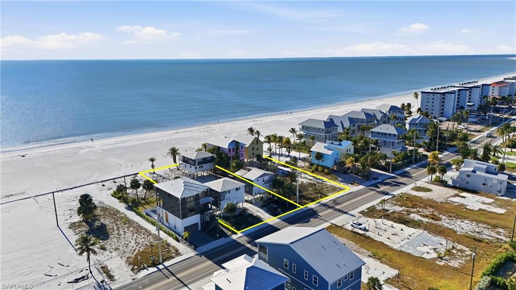 Coastal properties featuring direct beach frontage and expansive water