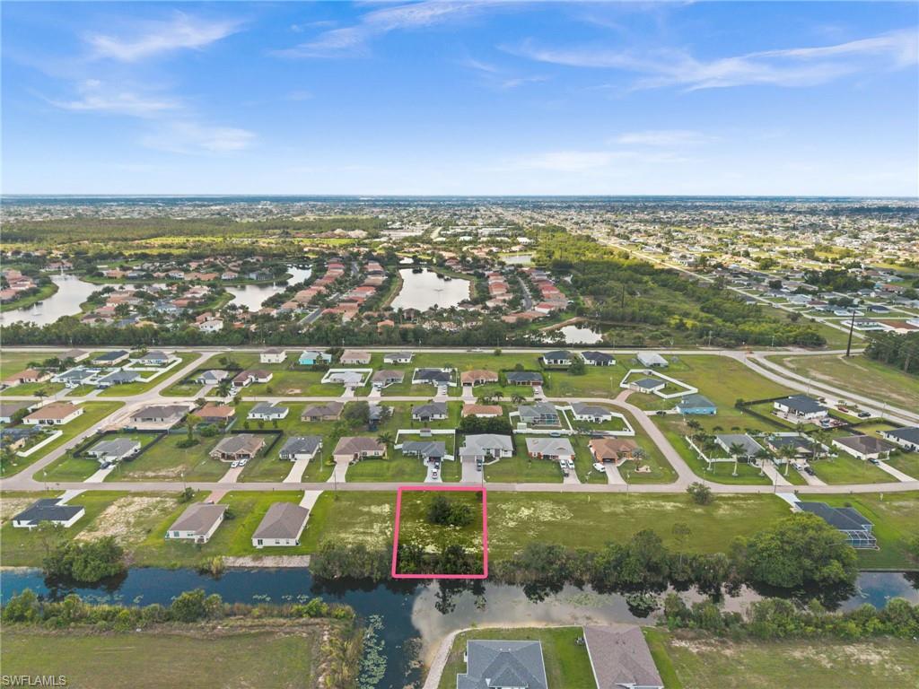Beautiful freshwater intersecting canal lot in NE Cape Coral