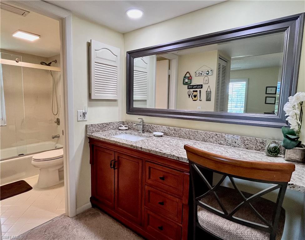 Singe vanity with large counter area.
