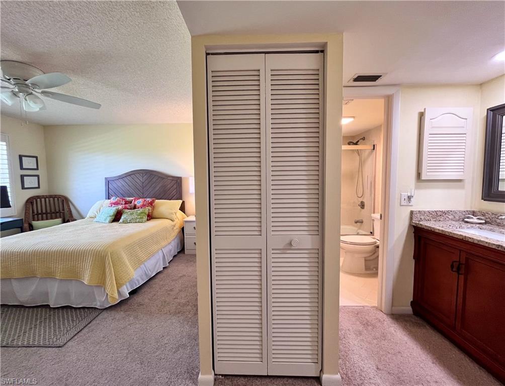 This area can be closed off with connecting bathroom to make it a suite.  Extra pantry closet for storage.