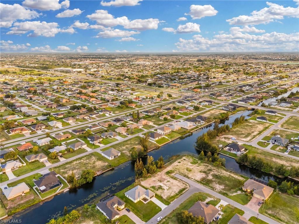 Residential neighborhood featuring canal-front properties and a mix of developed and undeveloped lots