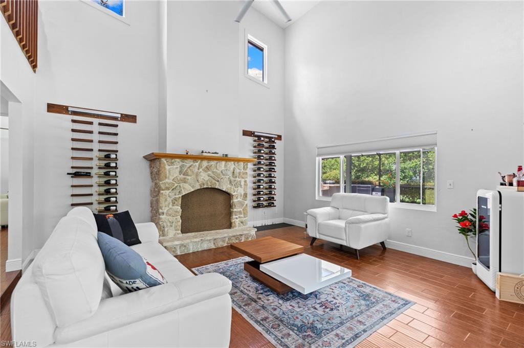 Living room with fire place and loft