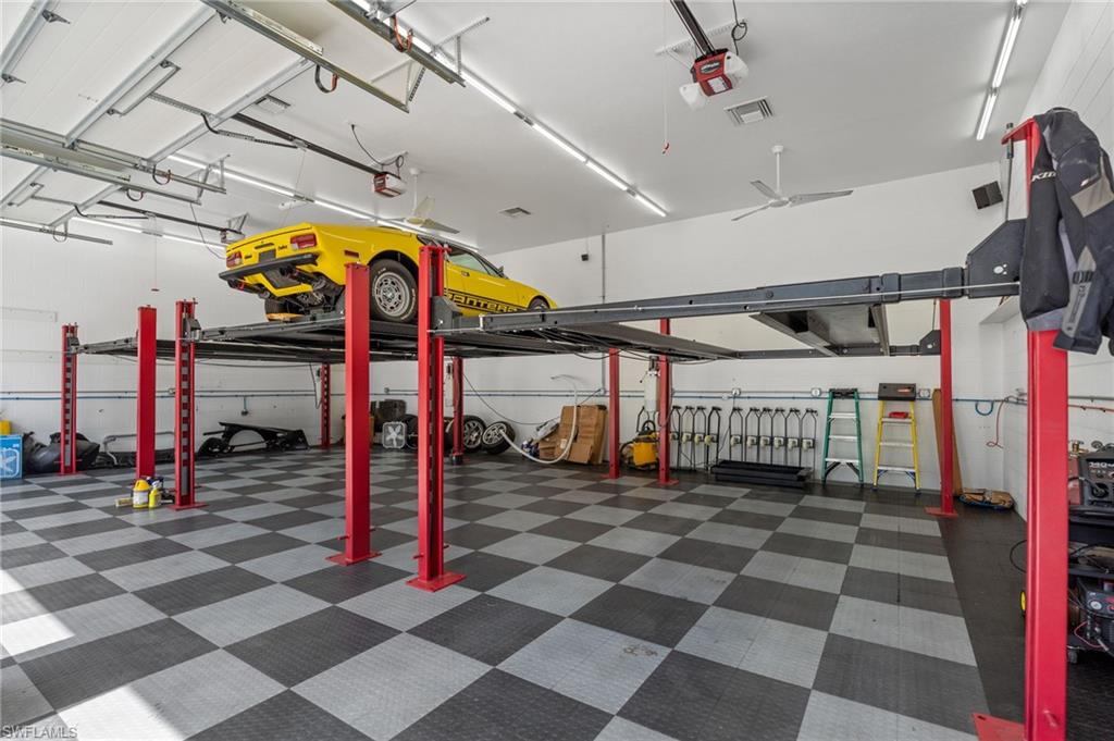 three newly installed high-capacity, industrial aluminum vehicle lifts to effortlessly house 6 cars.