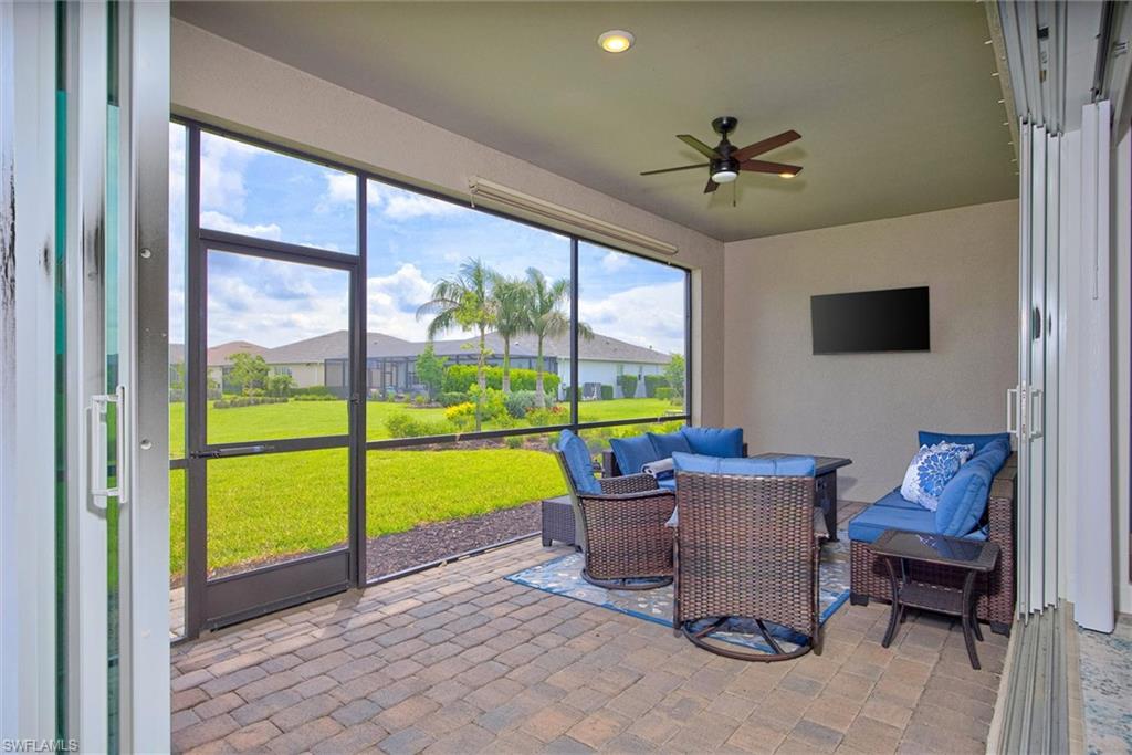 Relax and entertain on the spacious screened lanai overlooking serene lake views