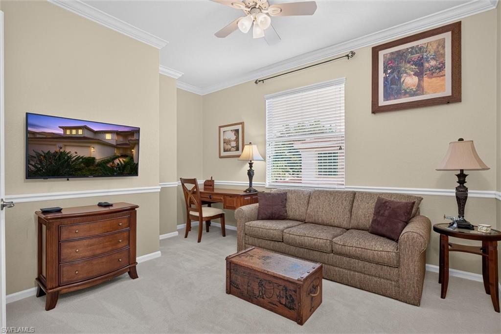 Neutral wall paint with chair rail molding and crown molding
