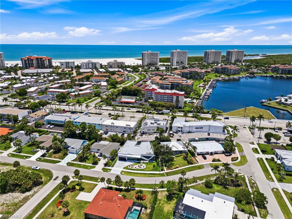 Aerial perspective showcasing a coastal community with prominent water features