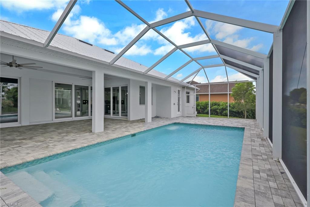 virtually staged, large 13' by 27' heated pool on 20' by 46" lanai