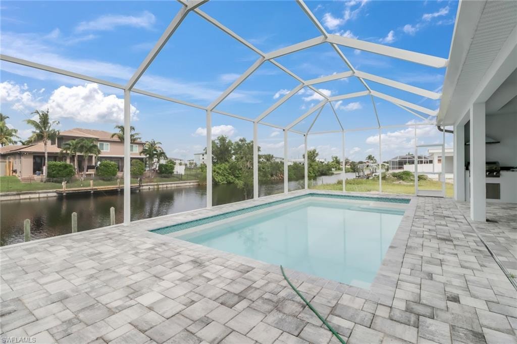 virtually staged, large 13' by 27' heated pool on 20' by 46" lanai