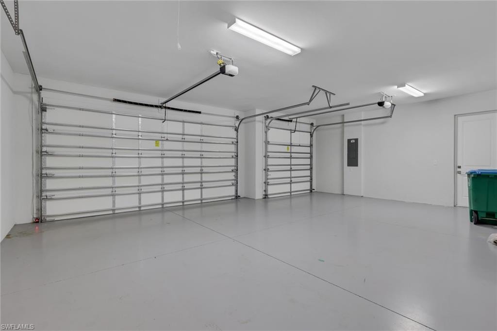 3 car garage with painted floor