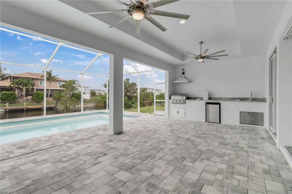 15' deep by 38' long under truss lanai with summer kitchen