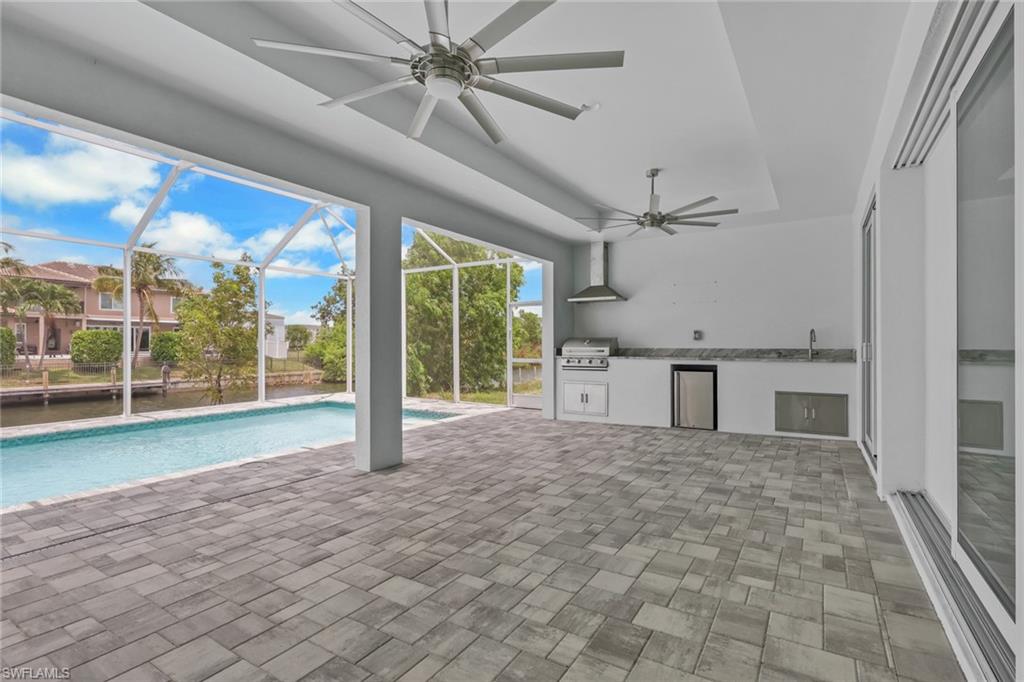 15' deep by 38' long under truss lanai with summer kitchen