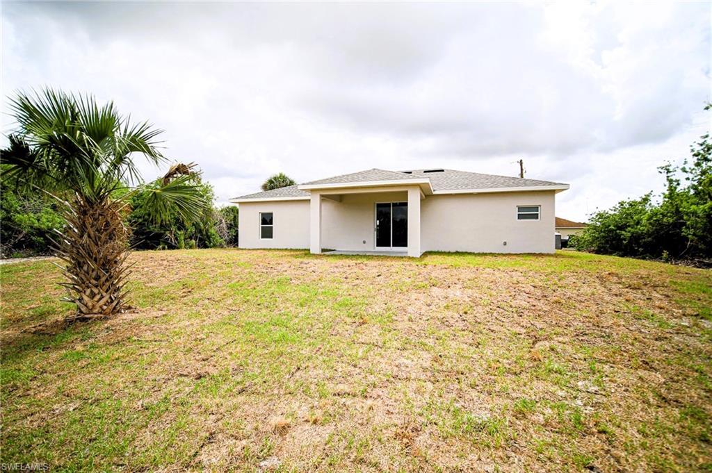 Awesome Back Yard With Penty Of Room For A Pool And It Comes With A Palm Tree!