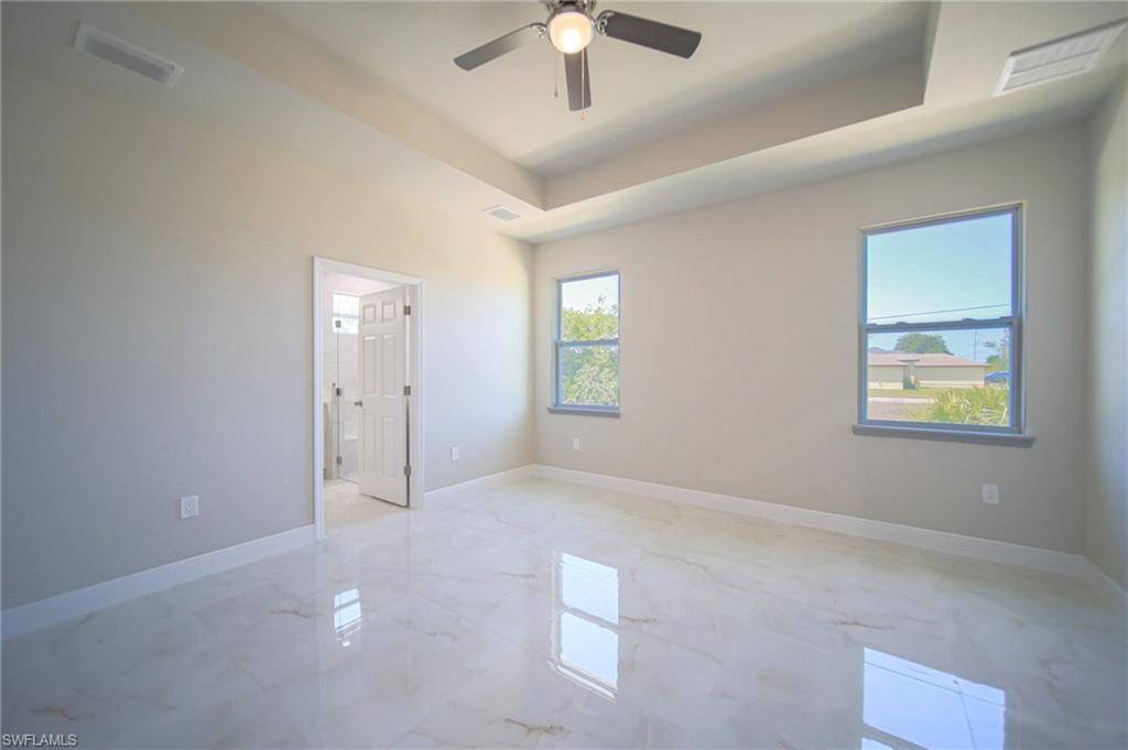 The Oversized Master Bedroom Has Multiple Windows, Tray Ceilings, Huge Walk-In Closet, And Ceiling Fan With Light!