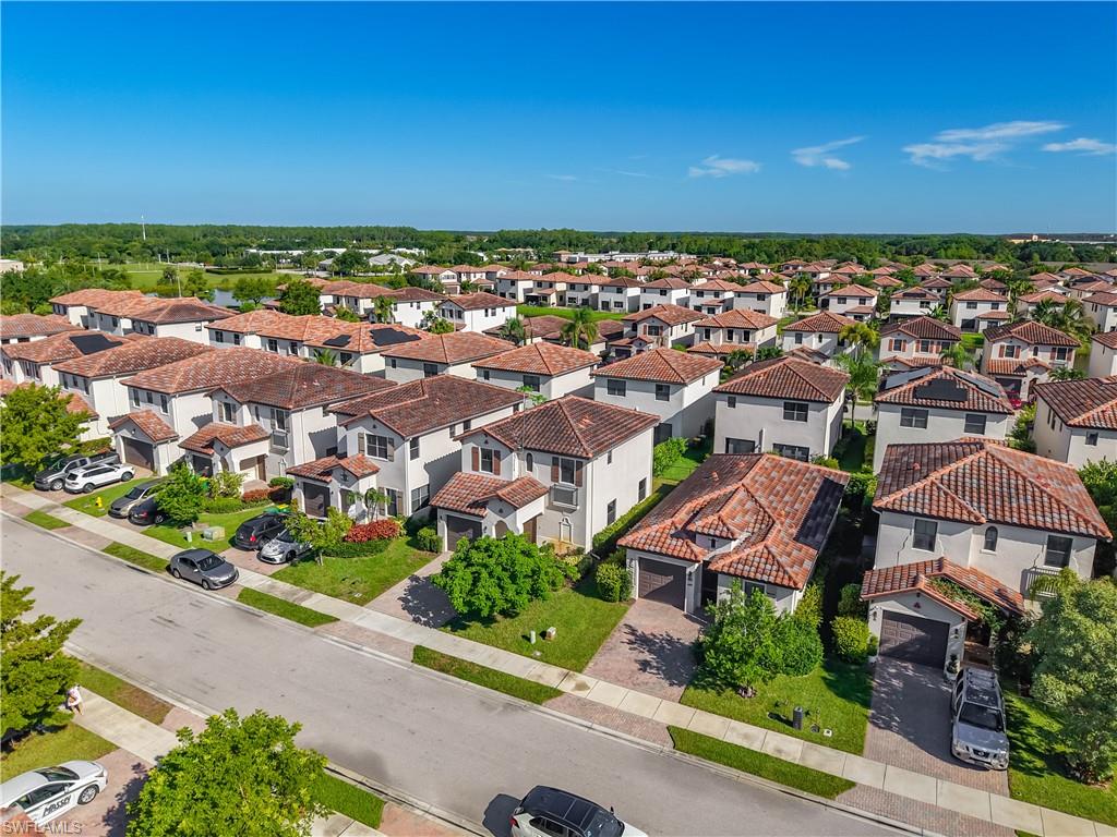 Aerial perspective showcasing a residential community with uniform architectural styles
