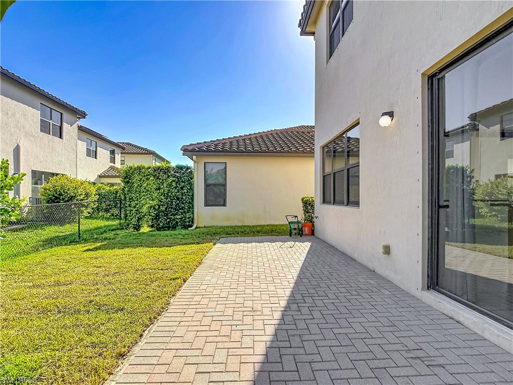 Paver patio with direct access to a sliding glass door