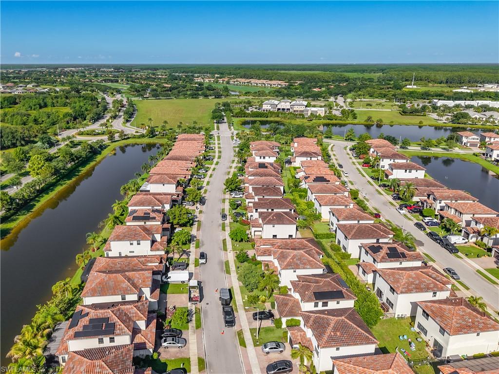 Aerial perspective showcasing a residential community with Mediterranean-style architecture