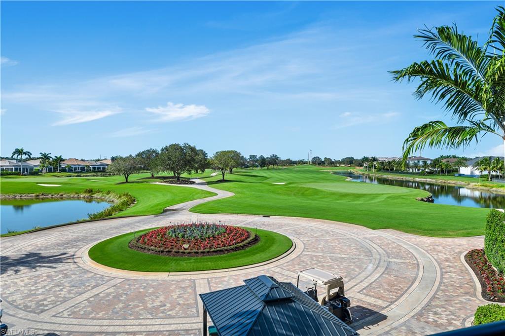 Expansive golf course frontage featuring manicured greens and tranquil water features