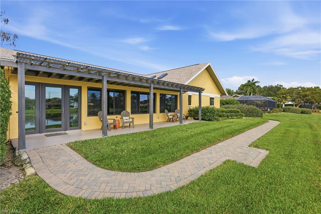 East-facing backyard with open space and lake views, ideal for morning sun and outdoor living