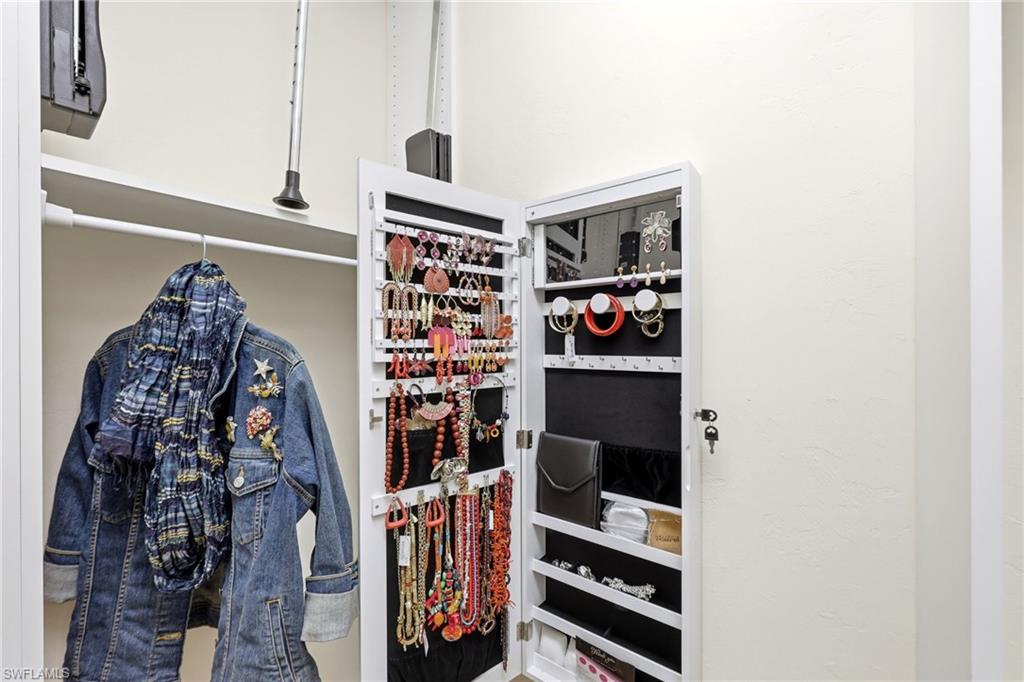 Walk-in closet with built-in organization and accessible storage, designed for easy reach and everyday functionality