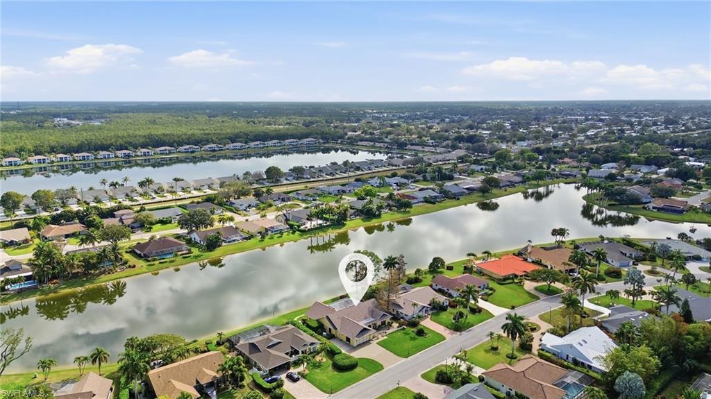 Aerial view showing lakefront location within Kings Lake, just minutes to downtown Naples and the beach