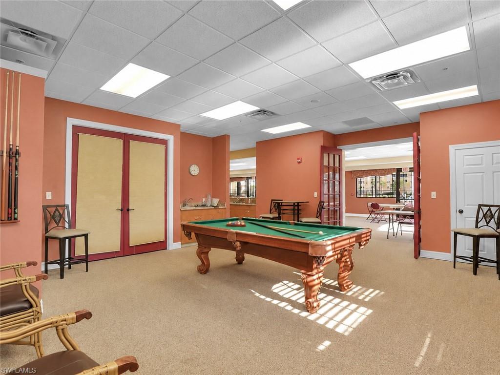 Osprey Cove recreational area featuring a billiard table, kitchen, and gathering room