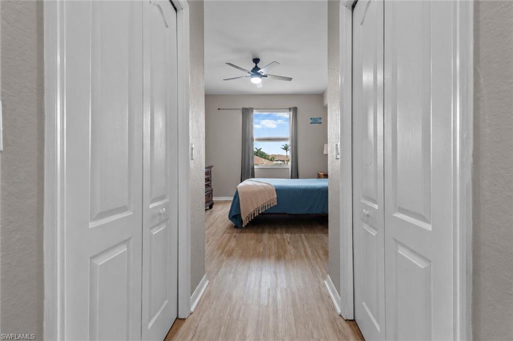 Primary bedroom features two walk-in closets