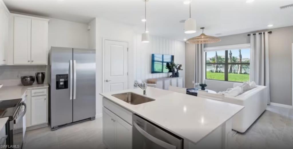Photos are of furnished model.