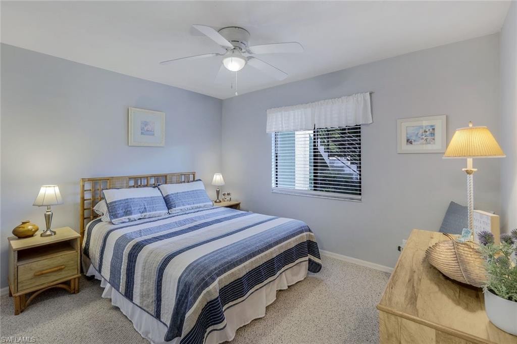 Light gray painted walls with a window featuring white horizontal blinds