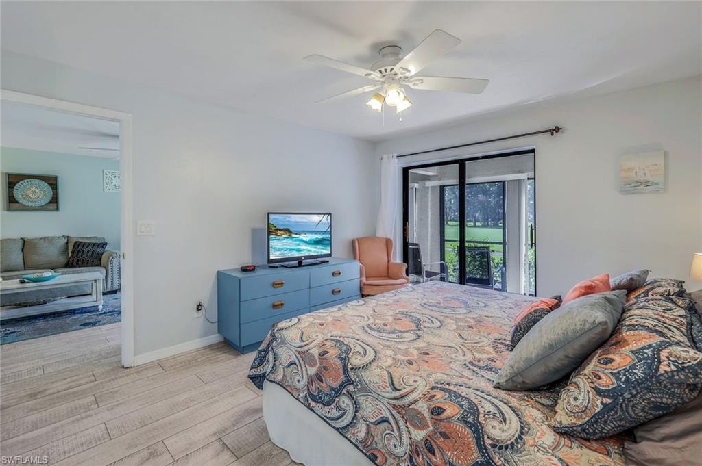Light-toned wood-finish flooring throughout