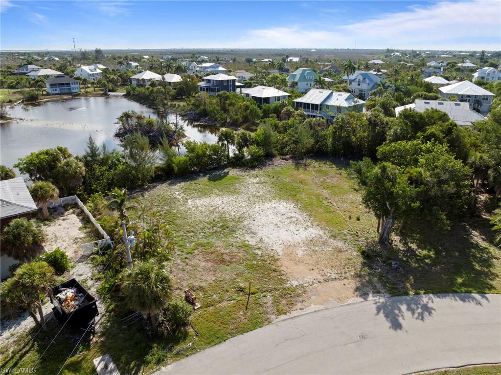 Cleared land parcel with partial tree coverage