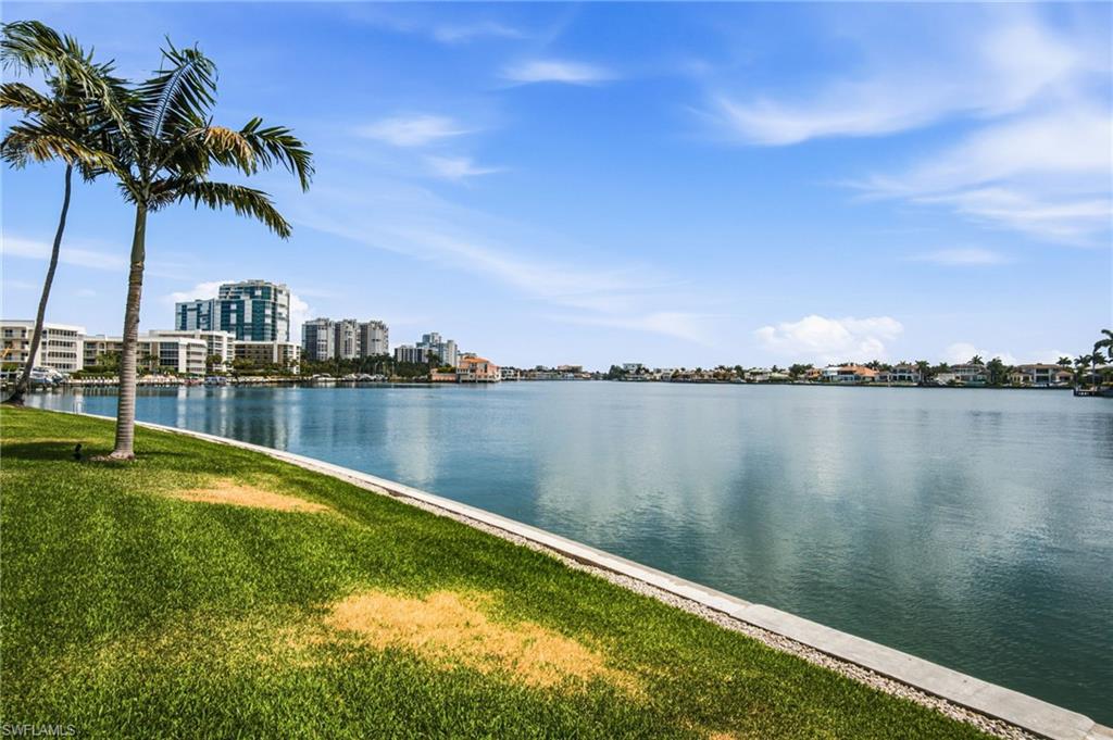 Beautifully maintained 4TH-FLOOR CONDO offers SPECTACULAR BAY VIEWS right outside your front door.