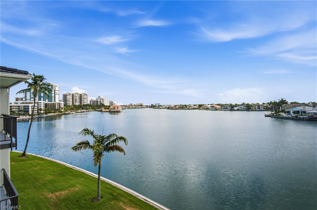 Beautifully maintained 4TH-FLOOR CONDO offers SPECTACULAR BAY VIEWS right outside your front door.
