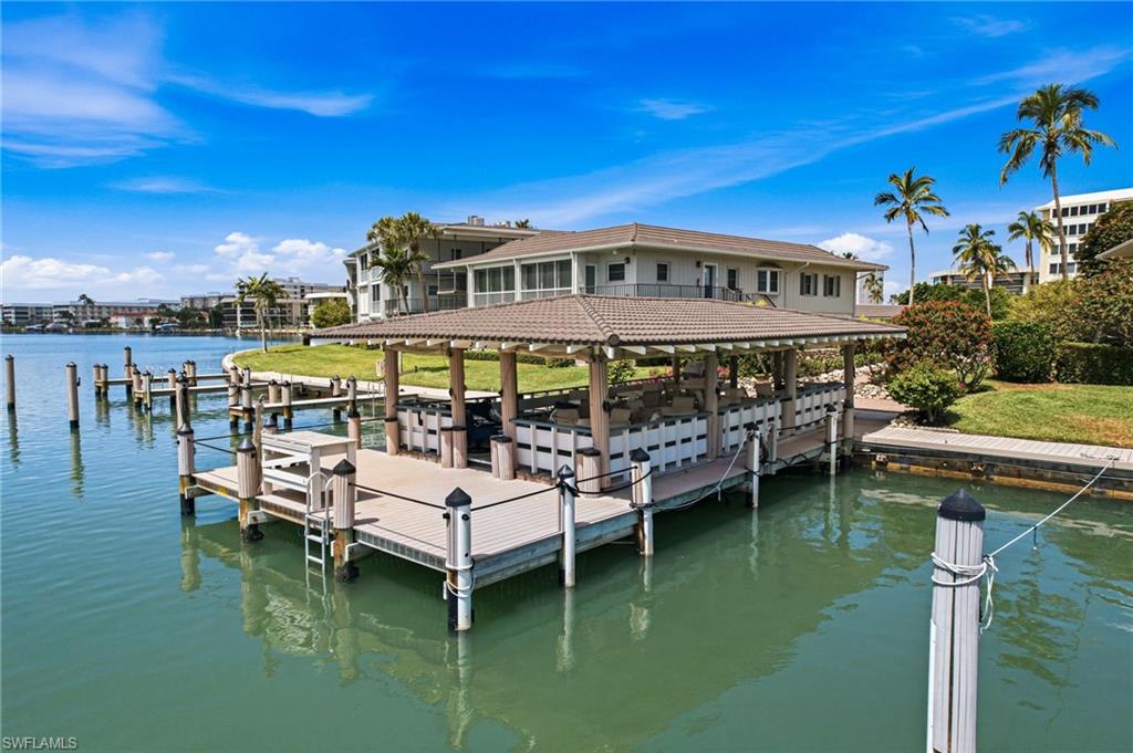 RESORT-STYLE AMENITIES, including a pool, bayfront pavilion ideal for entertaining or watching dolphins beneath breathtaking sunset skies, a clubhouse with year-round social events, and GULF-ACCESS BOAT SLIPS AVAILABLE FOR LEASE (subject to availability).