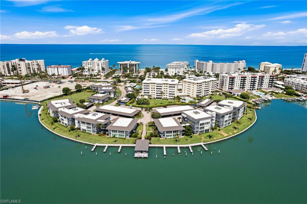 PRIME LOCATION places you just steps from the sugar-sand beaches of Naples