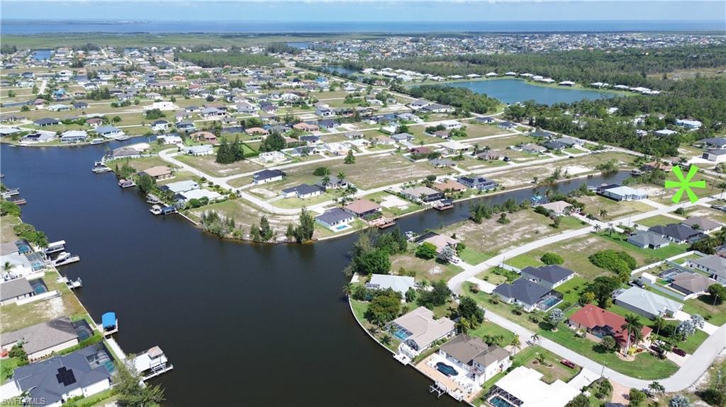 Waterfront community featuring canal access, residential streets, and established homes