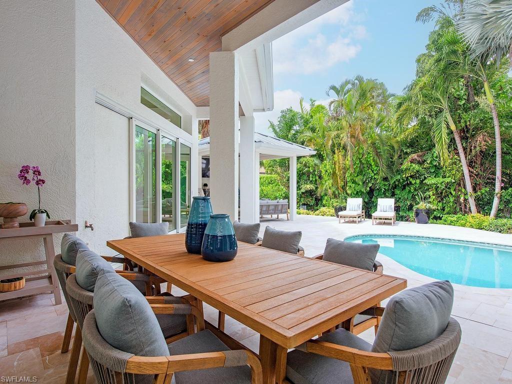 Covered patio featuring a wood-finish ceiling