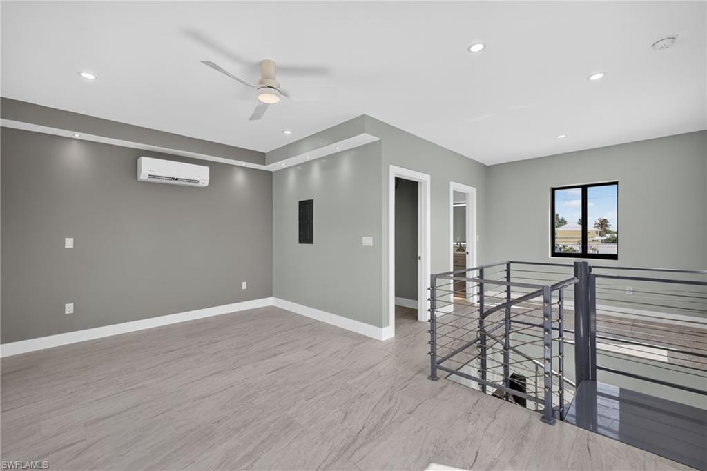 71 Mango Unit 1 Bedroom upper level space featuring wood-finish flooring and recessed lighting